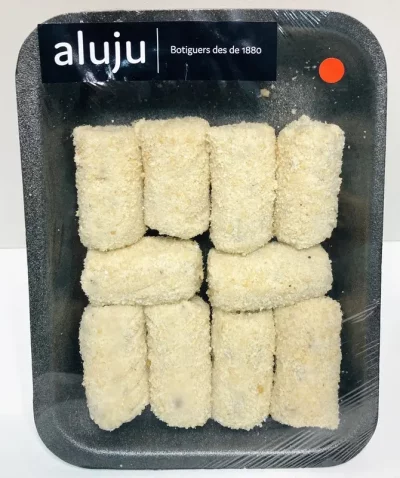 Croquetas de jamón Aluju en bandeja envasada, nueve unidades empanadas y listas para freír, con etiqueta visible y presentación artesanal.