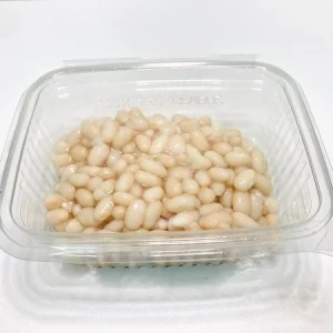 Envase transparente con monchetas cocidas Aluju, de color blanco brillante y textura tierna, listas para consumir.